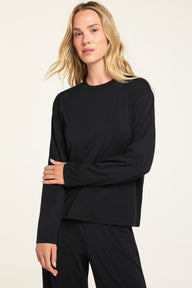 Front on-model shot of the Cloud Cotton Long Sleeve T-Shirt in Black paired with the Cloud Cotton Pant in Black.