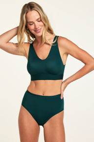 Three-quarter front view of the Bliss Highwaist Brief in Pine paired with the Bliss Bralette in Pine.
