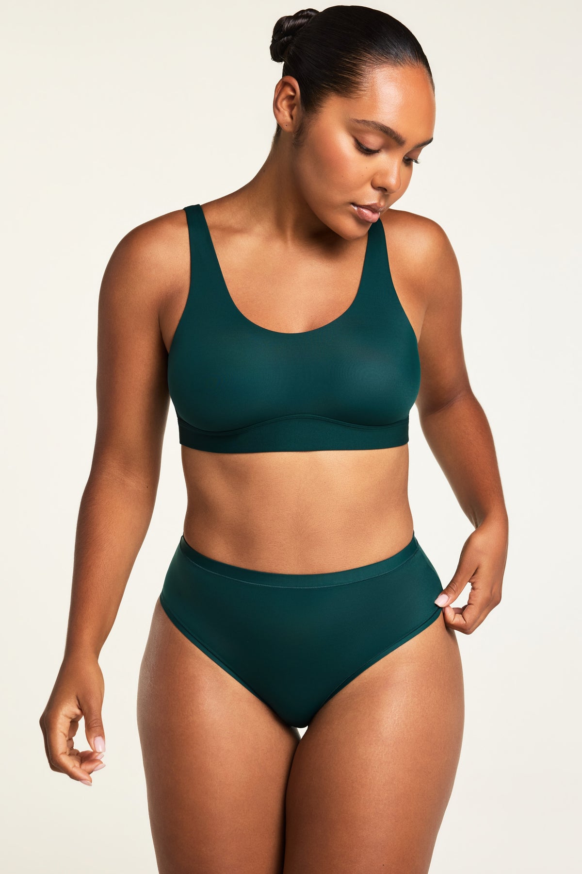 Three-quarter front view of the Bliss French Cut Brief in Pine paired with the Bliss Scoop Bralette in Pine.