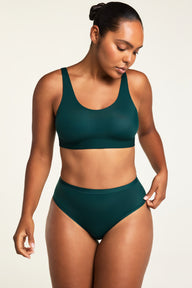 Three-quarter front view of the Bliss French Cut Brief in Pine paired with the Bliss Scoop Bralette in Pine.