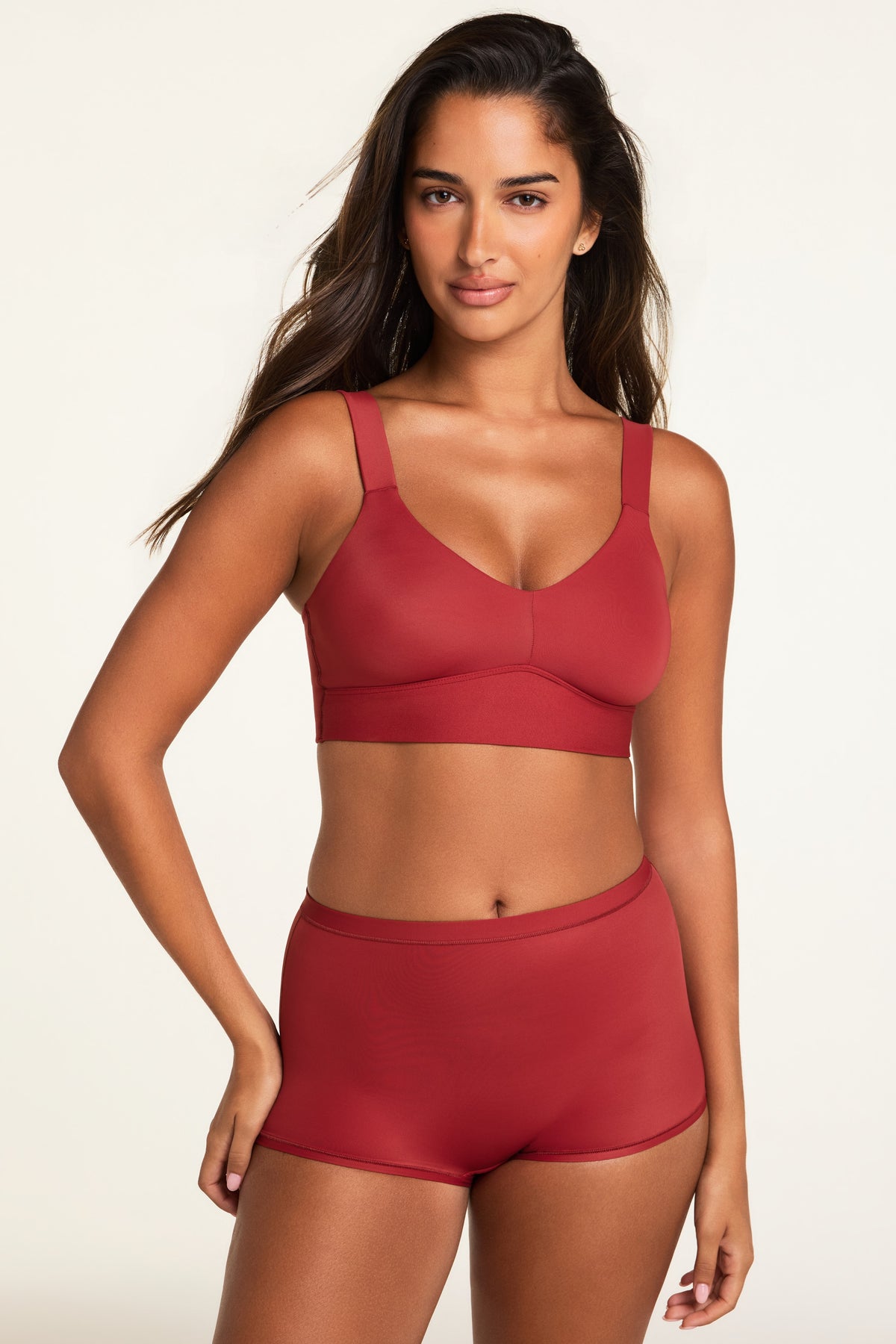 Three-quarter front view of the Bliss Boyshort in Ruby paired with the BlissSmooth Bralette in Ruby.