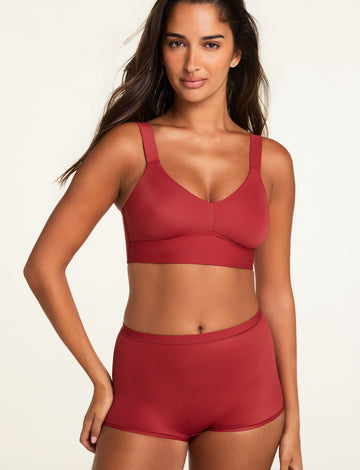 Three-quarter front view of the Bliss Boyshort in Ruby paired with the BlissSmooth Bralette in Ruby.