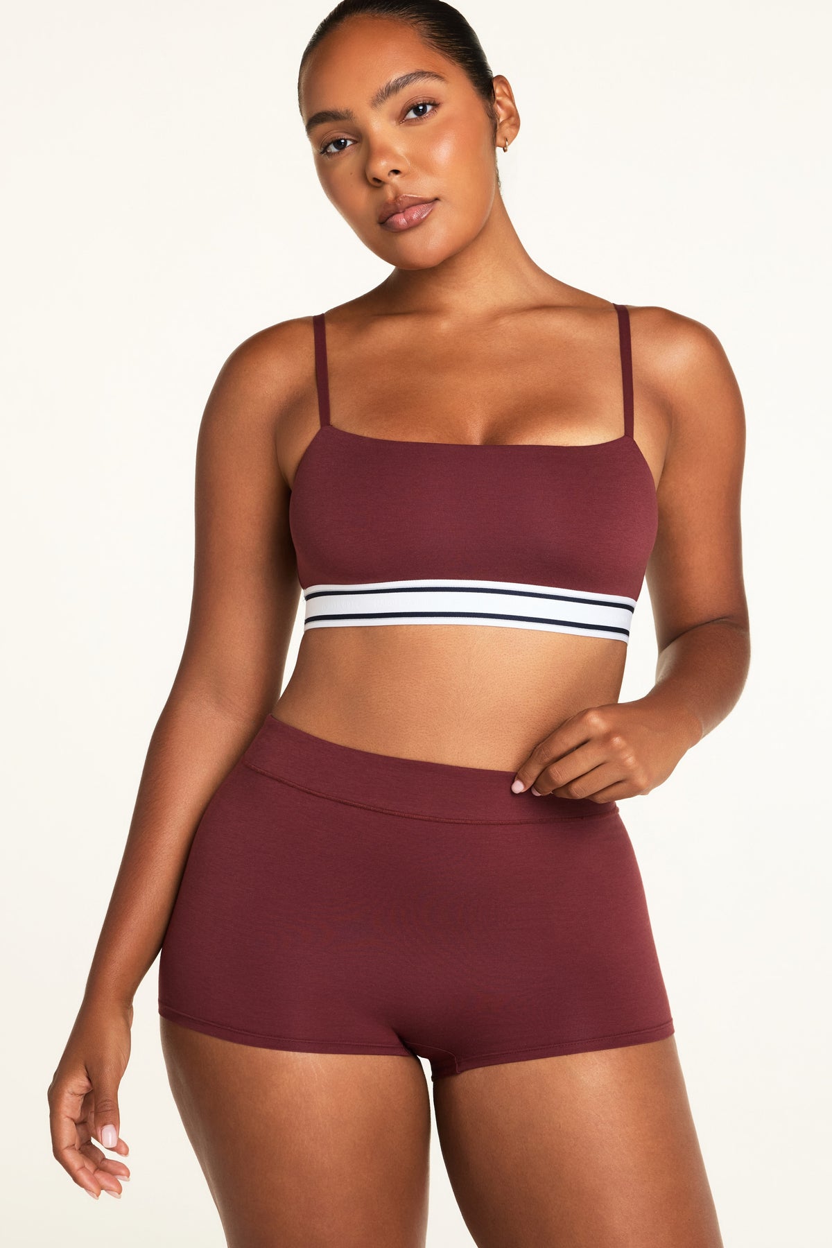 Three-quarter front view of the Cloud Cotton Highwaist Boyshort in Cabernet paired with the Cloud Cotton Bandeau Bralette in Cabernet.