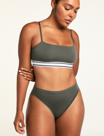 Three-quarter front view of the Cloud Cotton French Cut Brief in Olive paired with the Cloud Cotton Bandeau Bralette in Olive.