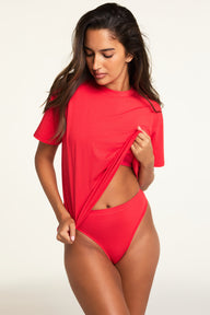 Three-quarter front view of the Cloud Cotton Highwaist Thong in Cherry paired with the Cloud Cotton T-Shirt in Cherry.