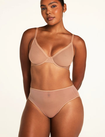 Three-quarter front view of the ComfortMesh™ Highwaist Brief in Taupe paired with the ComfortMesh™ Plunge Bra in Taupe.