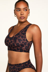 Three-quarter front view of the Bliss Bralette in Leopard paired with the Bliss French Cut Brief in Leopard.