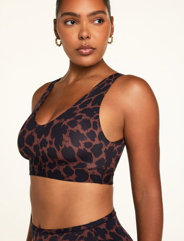Three-quarter front view of the Bliss Bralette in Leopard paired with the Bliss French Cut Brief in Leopard.