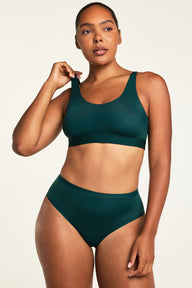 Three-quarter front view of the Bliss Scoop Bralette in Pine paired with the Bliss French Cut Brief in Pine.