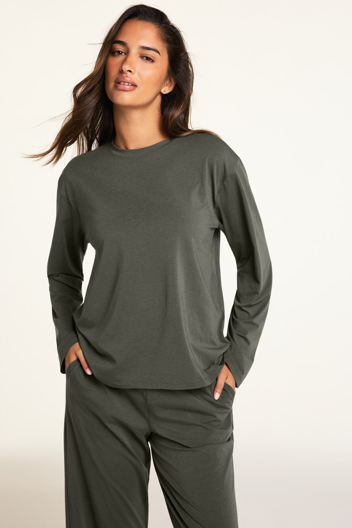Three-quarter front view of the Cloud Cotton Long Sleeve T-Shirt in Olive paired with the Cloud Cotton Pant in Olive.