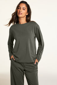 Three-quarter front view of the Cloud Cotton Long Sleeve T-Shirt in Olive paired with the Cloud Cotton Pant in Olive.