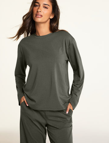 Three-quarter front view of the Cloud Cotton Long Sleeve T-Shirt in Olive paired with the Cloud Cotton Pant in Olive.