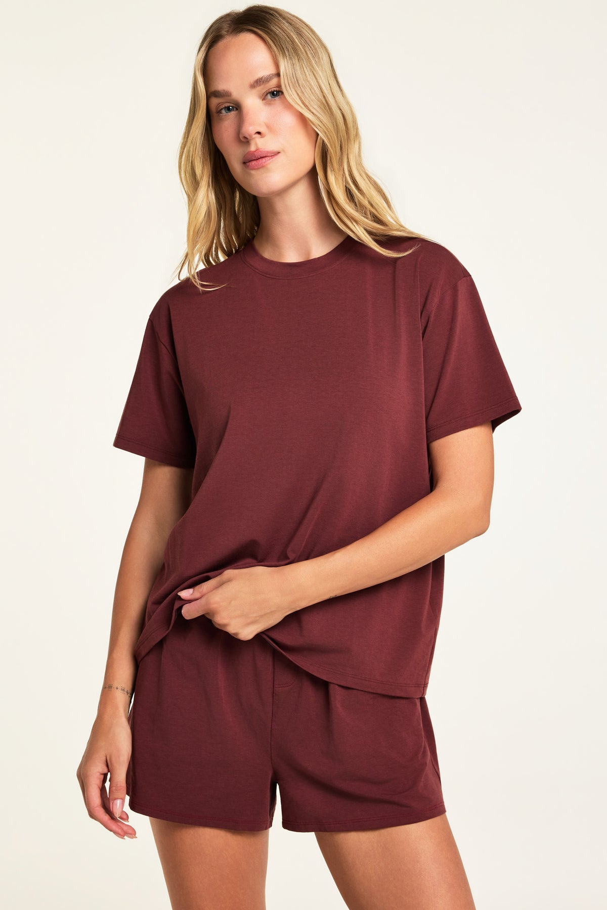 Three-quarter front view of the Cloud Cotton T-Shirt in Cabernet paired with the Cloud Cotton Short in Cabernet.