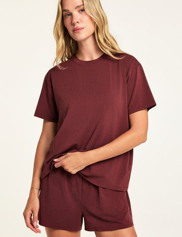 Three-quarter front view of the Cloud Cotton T-Shirt in Cabernet paired with the Cloud Cotton Short in Cabernet.