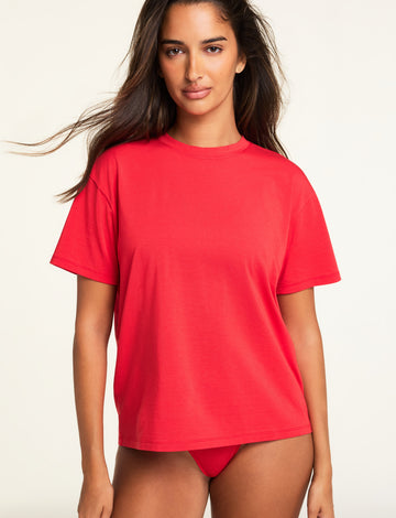 Three-quarter front view of the Cloud Cotton T-Shirt in Cherry paired with the Cloud Cotton Highwaist Thong in Cherry.