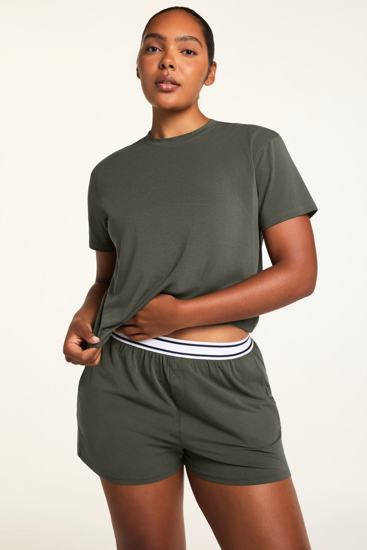 Three-quarter front view of the Cloud Cotton T-Shirt in Olive paired with the Cloud Cotton Short in Olive.