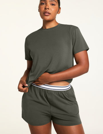 Three-quarter front view of the Cloud Cotton T-Shirt in Olive paired with the Cloud Cotton Short in Olive.