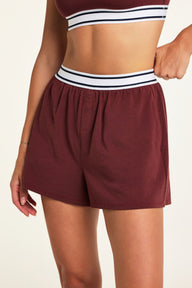 Back on-model view of the Cloud Cotton Short in Cabernet paired with the Cloud Cotton T-Shirt in Cabernet.