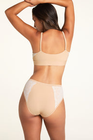 Back view of the Bliss Lace Highwaist Brief in Beige, showing smooth beige back coverage with white geometric fan lace panels visible on either side, paired with the Bliss Lace Bralette in Beige with thin adjustable straps and smooth beige back band