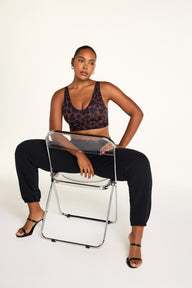 Editorial on-model shot of the Bliss Bralette in Bliss Leopard styled with the Bliss French Cut Brief in Bliss Leopard.