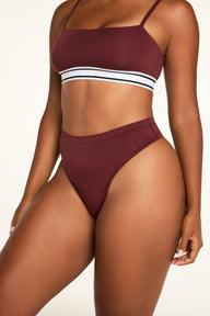 Back on-model view of the Cloud Cotton Highwaist Thong in Cabernet paired with the Cloud Cotton Bandeau Bralette in Cabernet.