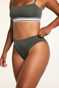 Back on-model view of the Cloud Cotton French Cut Brief in Olive paired with the Cloud Cotton Bandeau Bralette in Olive.