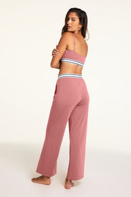 Back on-model view of the Cloud Cotton Pant in Winter Rose paired with the Cloud Cotton Bandeau Bralette in Winter Rose.