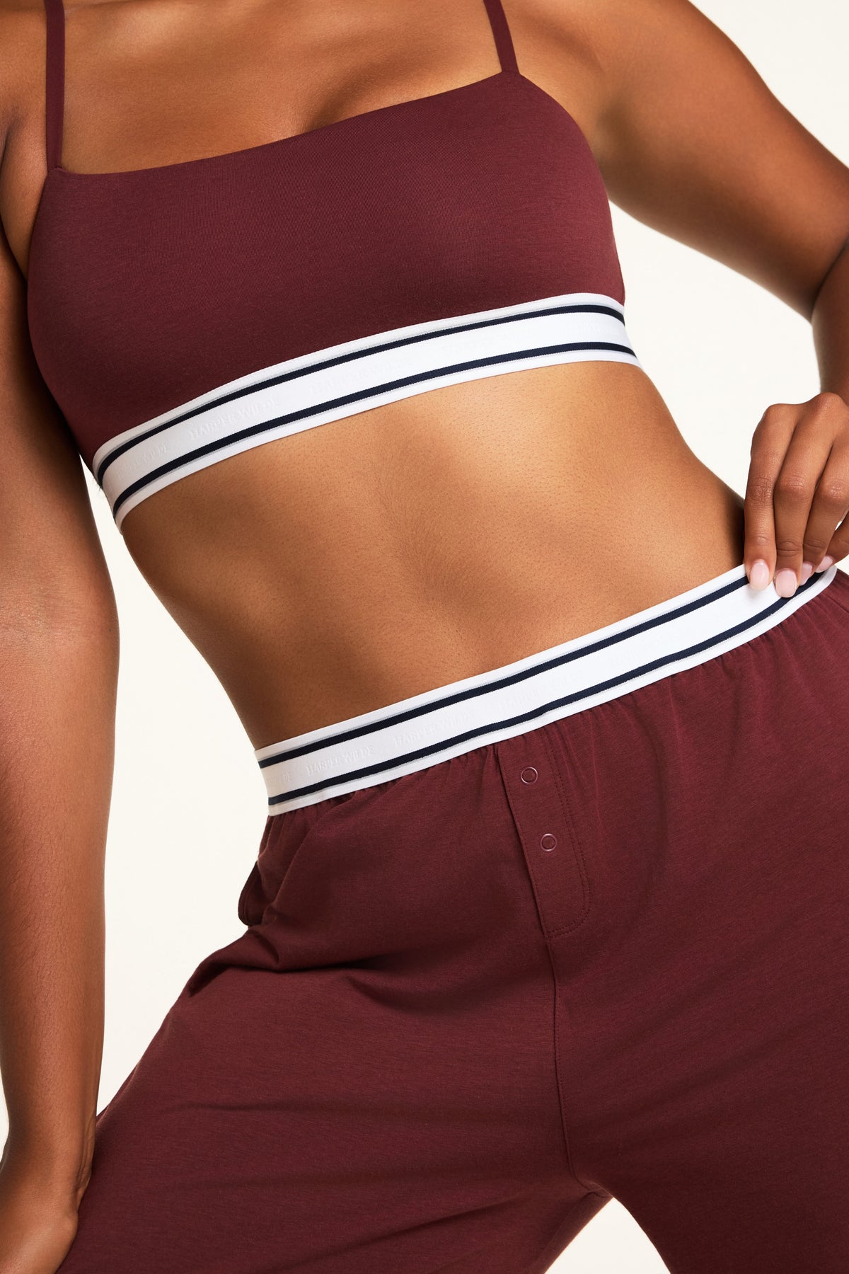 Back on-model view of the Cloud Cotton Pant in Cabernet paired with the Cloud Cotton Long Sleeve T-Shirt in Cabernet.