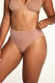 Back on-model view of the ComfortMesh™ Highwaist Brief in Taupe paired with the ComfortMesh™ Plunge Bra in Taupe.