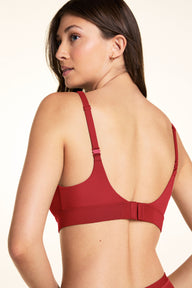 Close-up back view of the Bliss Plunge Adjustable Bralette in Ruby paired with the Bliss Boyshort in Ruby.
