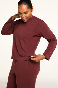 Back on-model view of the Cloud Cotton Long Sleeve T-Shirt in Cabernet paired with the Cloud Cotton Pant in Cabernet.