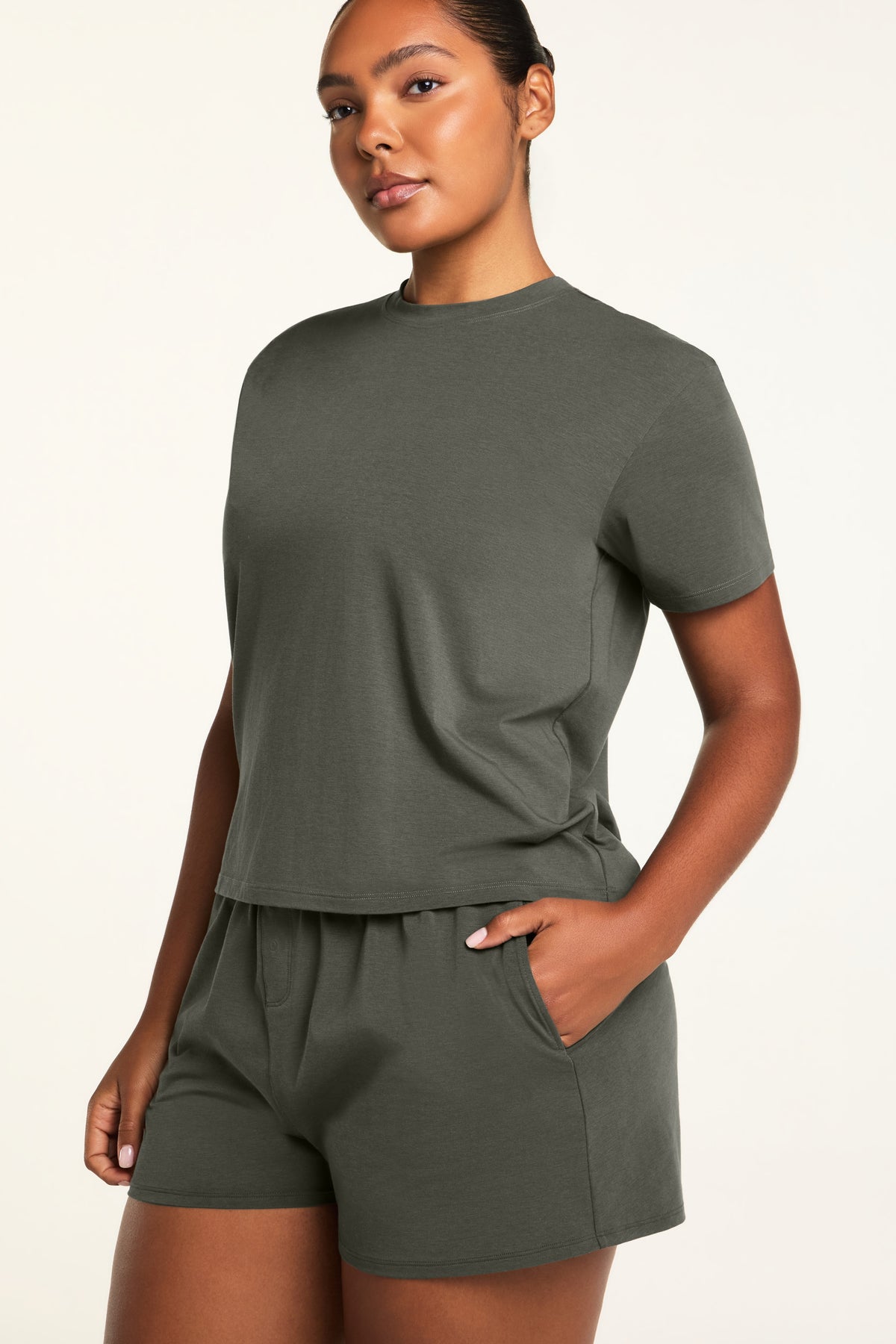 Back on-model view of the Cloud Cotton T-Shirt in Olive paired with the Cloud Cotton Short in Olive.