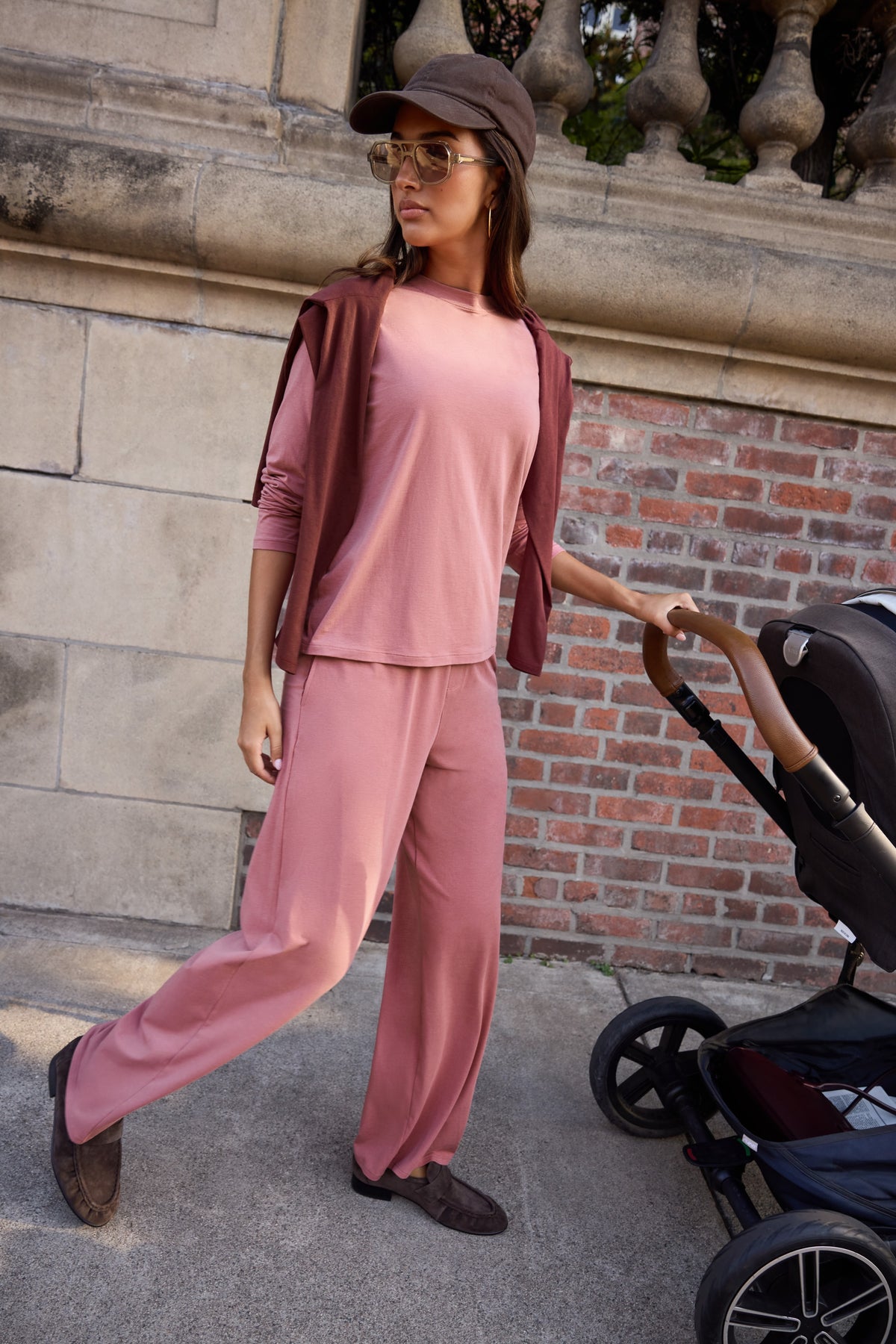 Lifestyle on-model shot of the Cloud Cotton Long Sleeve T-Shirt in Winter Rose paired with the Cloud Cotton Pant in Winter Rose.