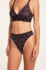 Close-up front view of the Bliss Thong in Leopard paired with the Bliss Triangle Bralette in Leopard.