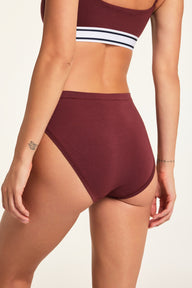 Close-up front view of the Cloud Cotton French Cut Brief in Cabernet paired with the Cloud Cotton Bandeau Bralette in Cabernet.