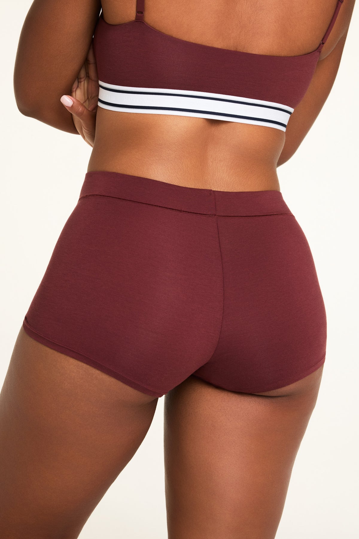 Close-up front view of the Cloud Cotton Highwaist Boyshort in Cabernet paired with the Cloud Cotton Bandeau Bralette in Cabernet.