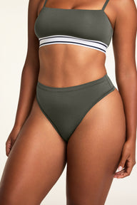 Close-up front view of the Cloud Cotton Highwaist Thong in Olive paired with the Cloud Cotton Bandeau Bralette in Olive.