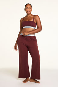 Close-up front view of the Cloud Cotton Pant in Cabernet paired with the Cloud Cotton Long Sleeve T-Shirt in Cabernet.