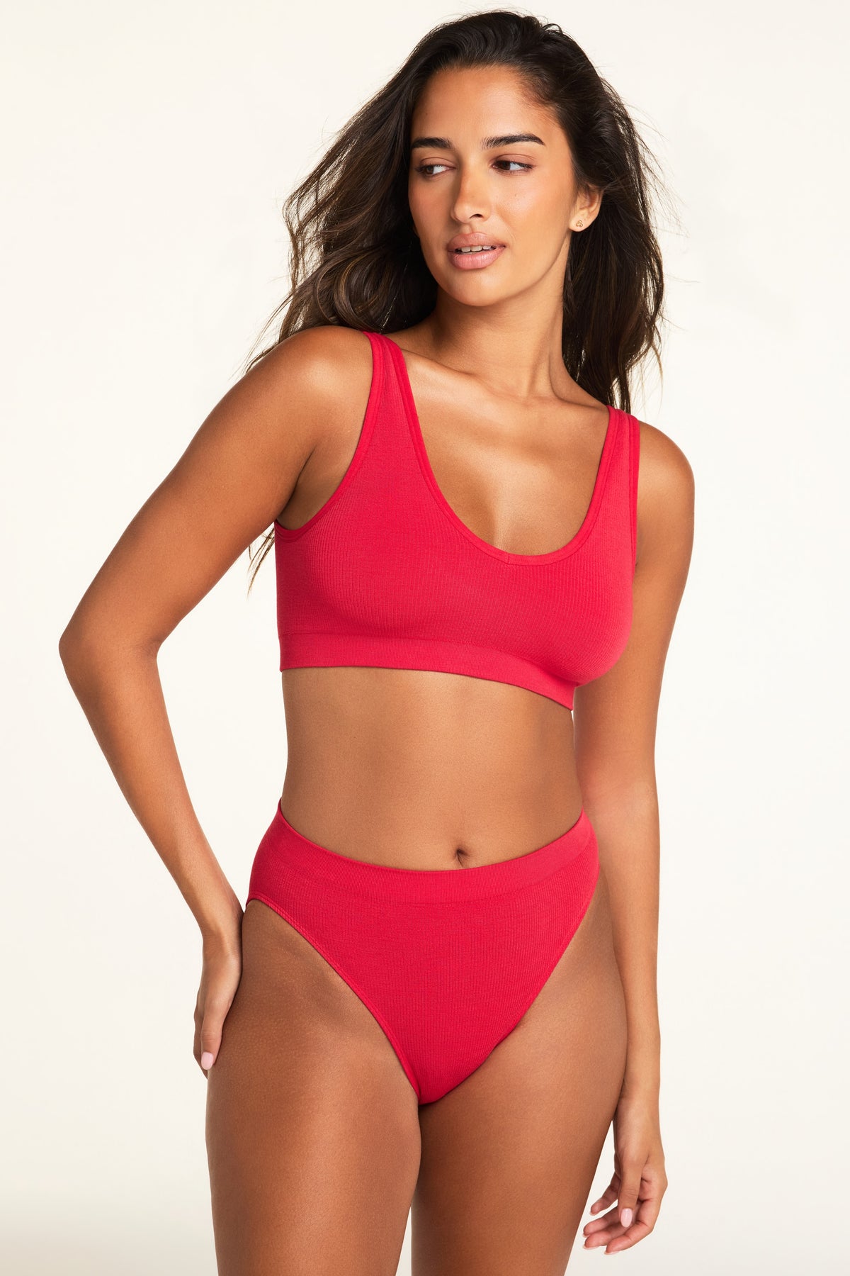 Close-up front view of the Knit Seamless French Cut Brief in Cherry paired with the Knit Seamless Bralette in Cherry.
