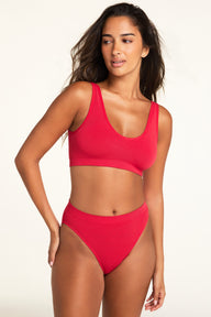 Close-up front view of the Knit Seamless French Cut Brief in Cherry paired with the Knit Seamless Bralette in Cherry.