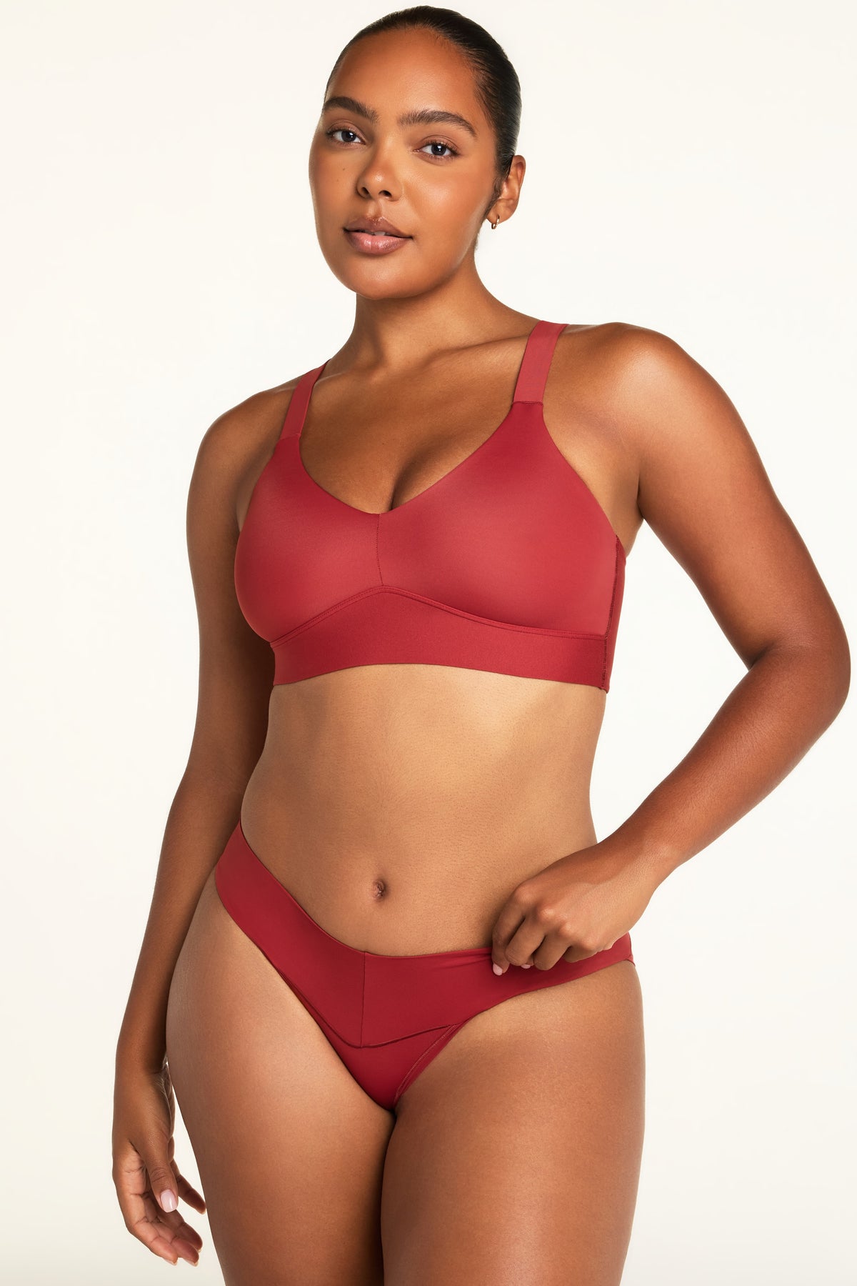 Close-up front view of the BlissSmooth Bralette in Ruby paired with the Bliss Low Rise Bikini in Ruby.