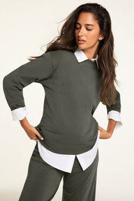 On-model product shot of the Cloud Cotton Long Sleeve T-Shirt in Olive paired with the Cloud Cotton Pant in Olive.