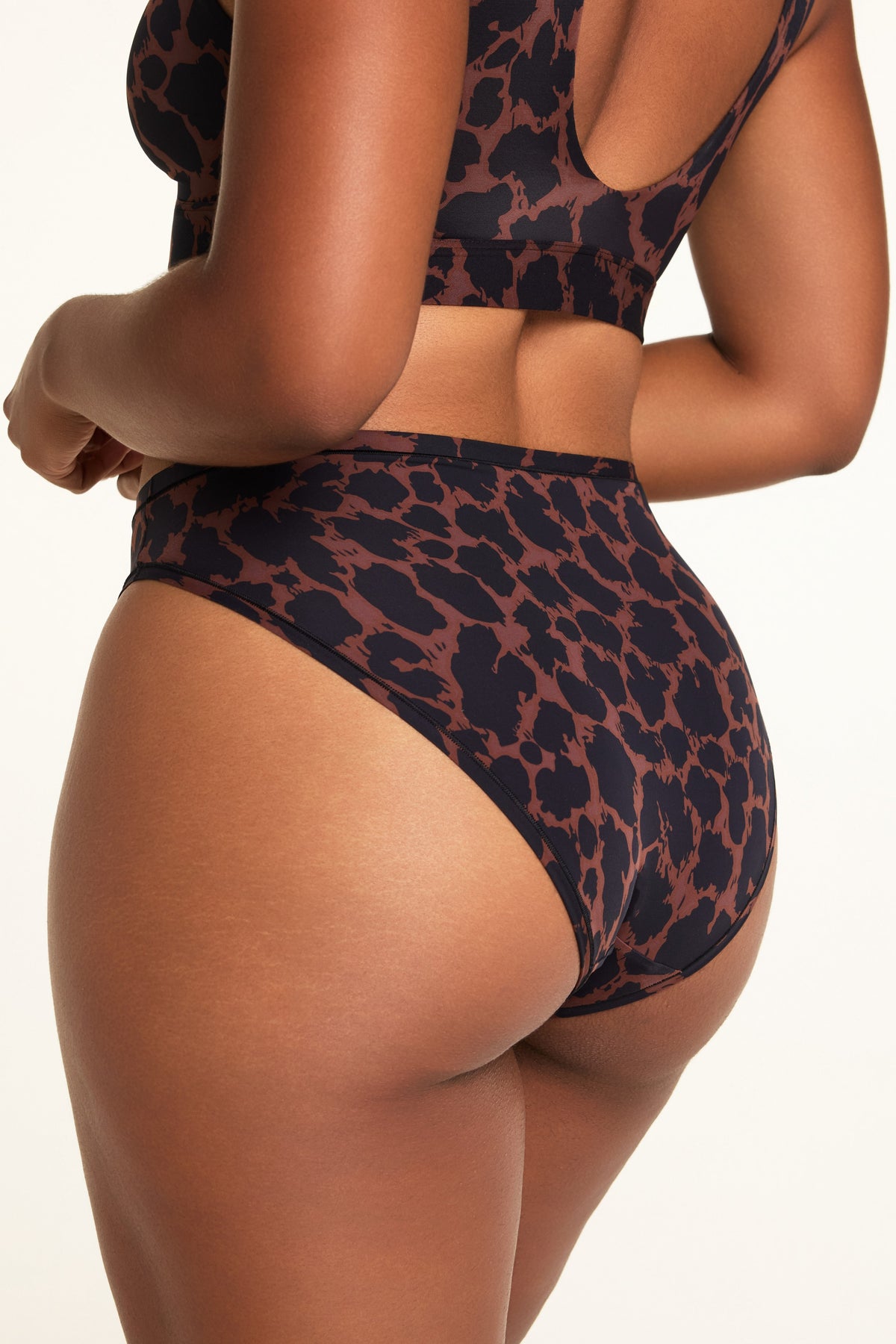 Side on-model view of the Bliss French Cut Brief in Leopard paired with the Bliss Bralette in Leopard.