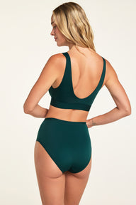 Side on-model view of the Bliss Highwaist Brief in Pine paired with the Bliss Bralette in Pine.