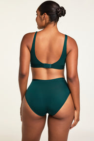Side on-model view of the Bliss French Cut Brief in Pine paired with the Bliss Scoop Bralette in Pine.