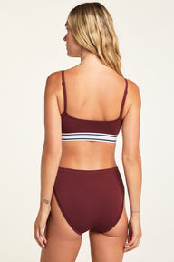 Side on-model view of the Cloud Cotton French Cut Brief in Cabernet paired with the Cloud Cotton Bandeau Bralette in Cabernet.