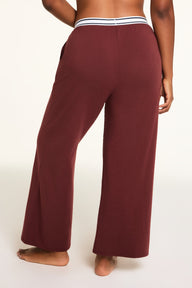 Side on-model view of the Cloud Cotton Pant in Cabernet paired with the Cloud Cotton Long Sleeve T-Shirt in Cabernet.