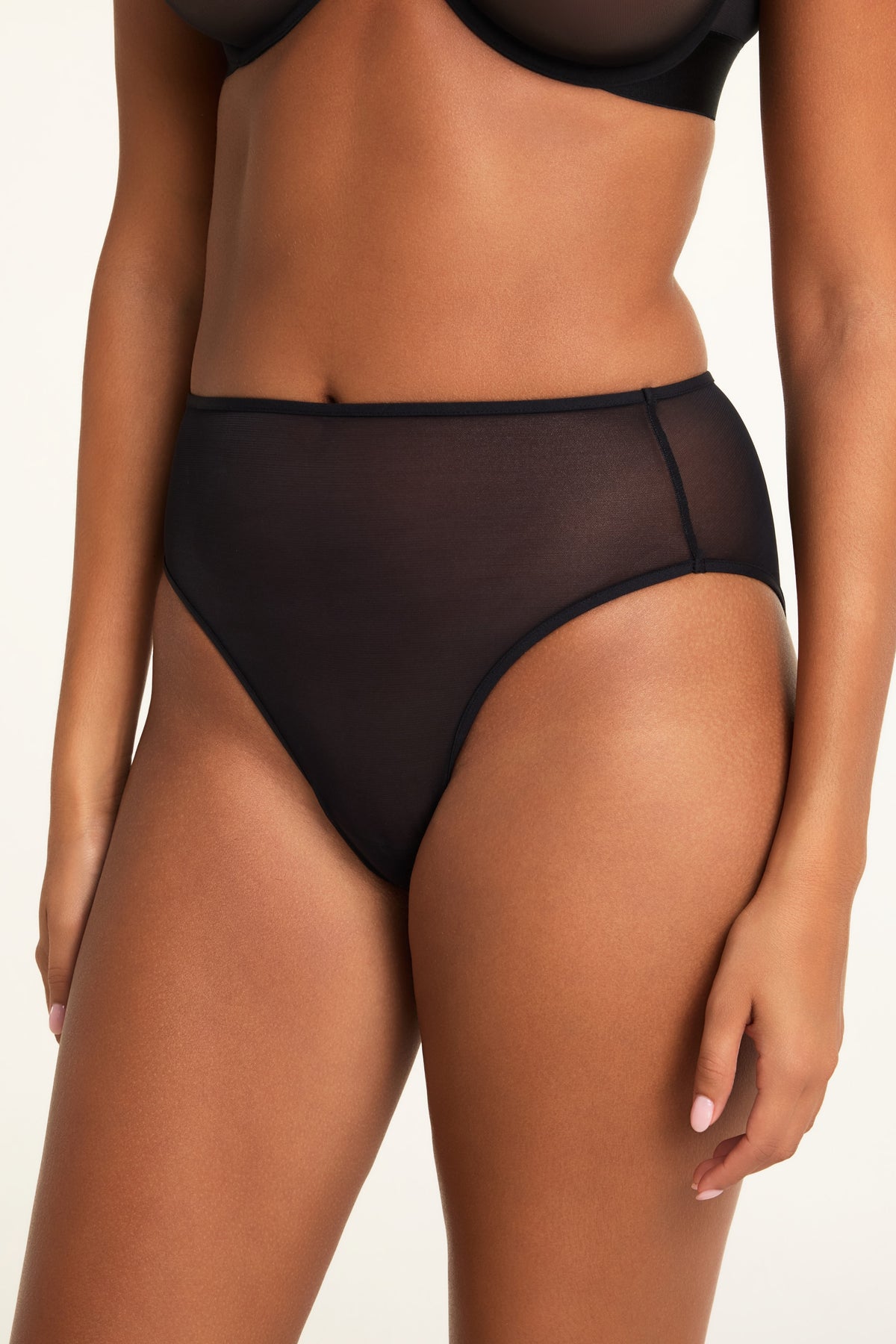 Side on-model view of the Cloud Cotton Short in Cherry paired with the ComfortMesh™ Plunge Bra in Black.