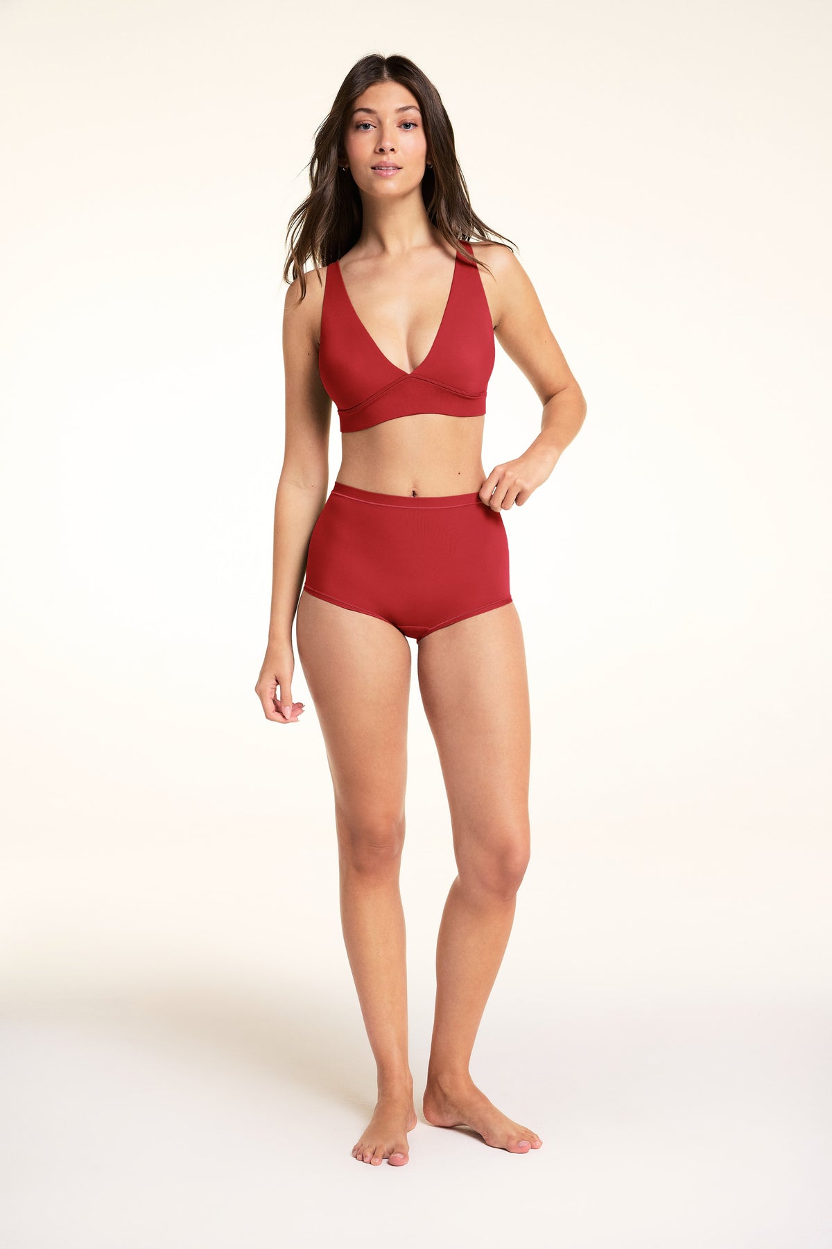 Front on-model shot of the Bliss Plunge Adjustable Bralette in Ruby paired with the Bliss Boyshort in Ruby.
