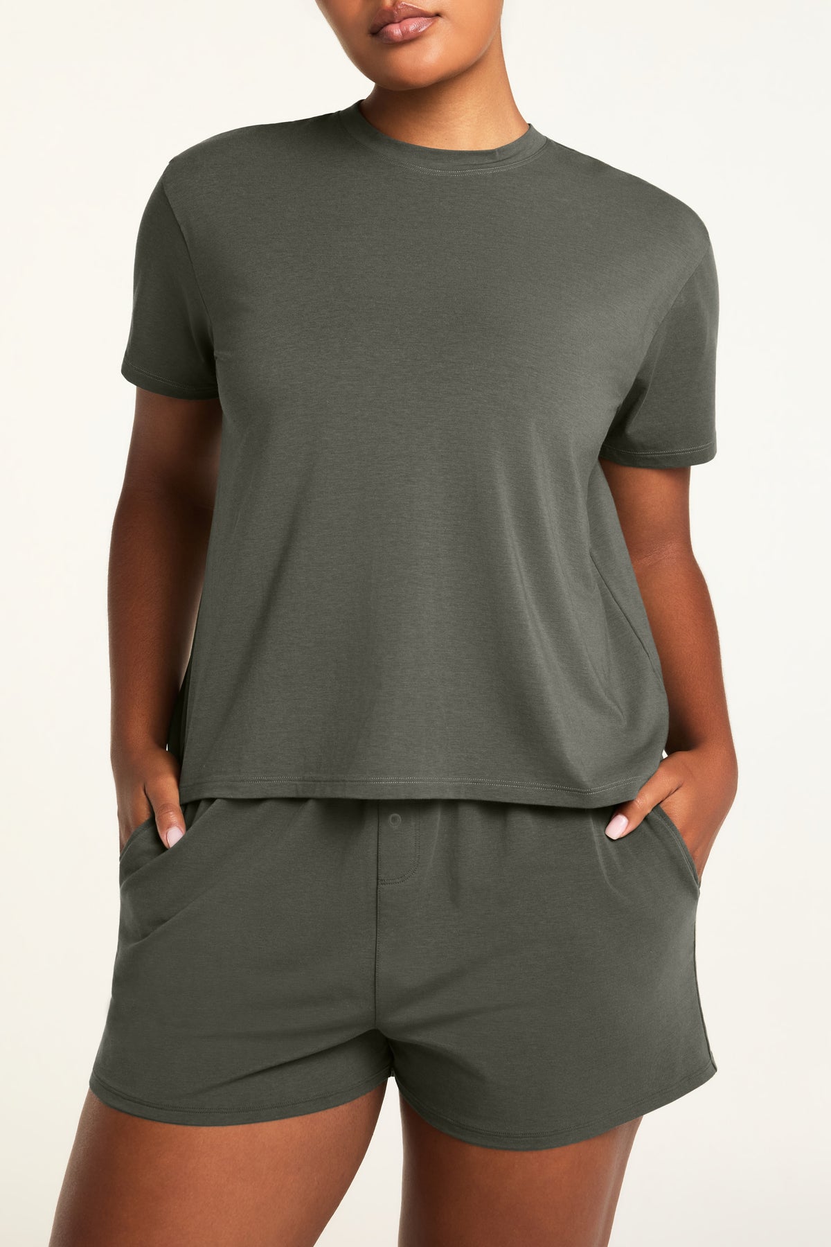 Side on-model view of the Cloud Cotton T-Shirt in Olive paired with the Cloud Cotton Short in Olive.
